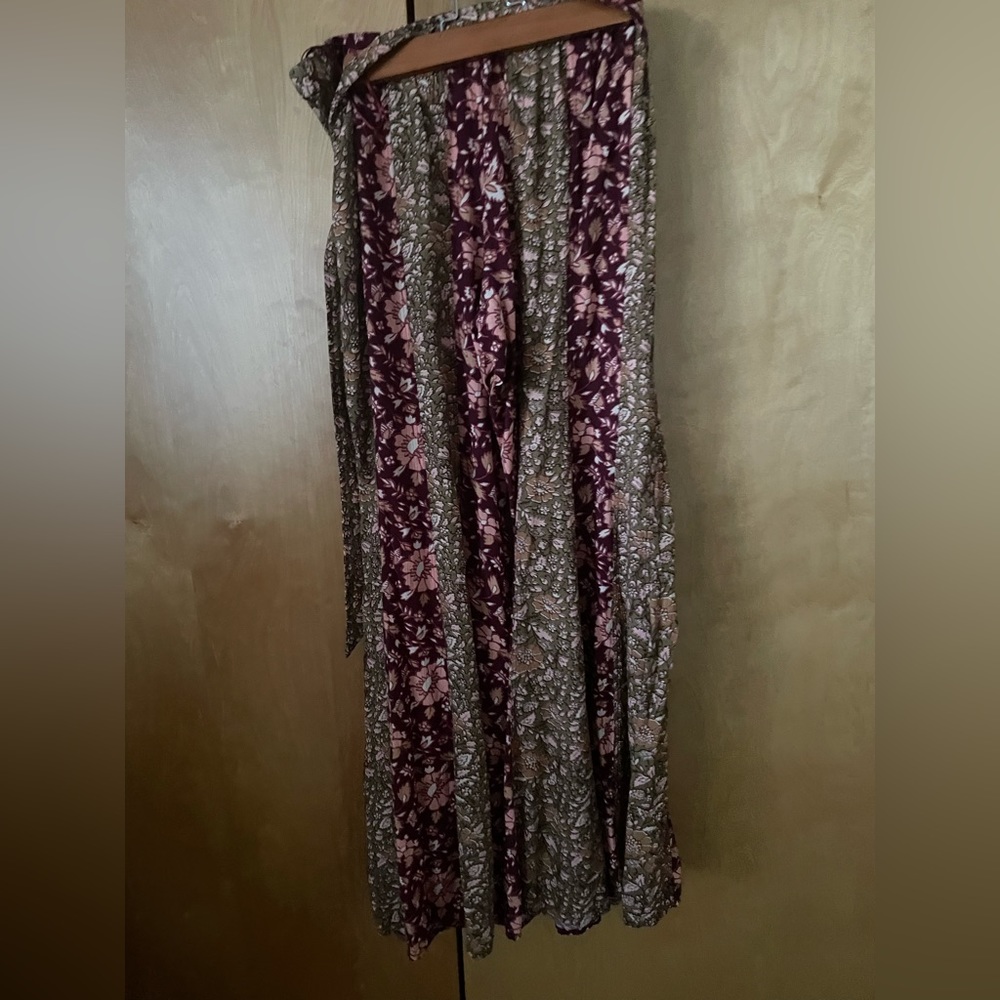 NWOT! Free People Bali Boho flare pants. Color multi reds and greens. Sizes: M,L - Picture 8 of 14